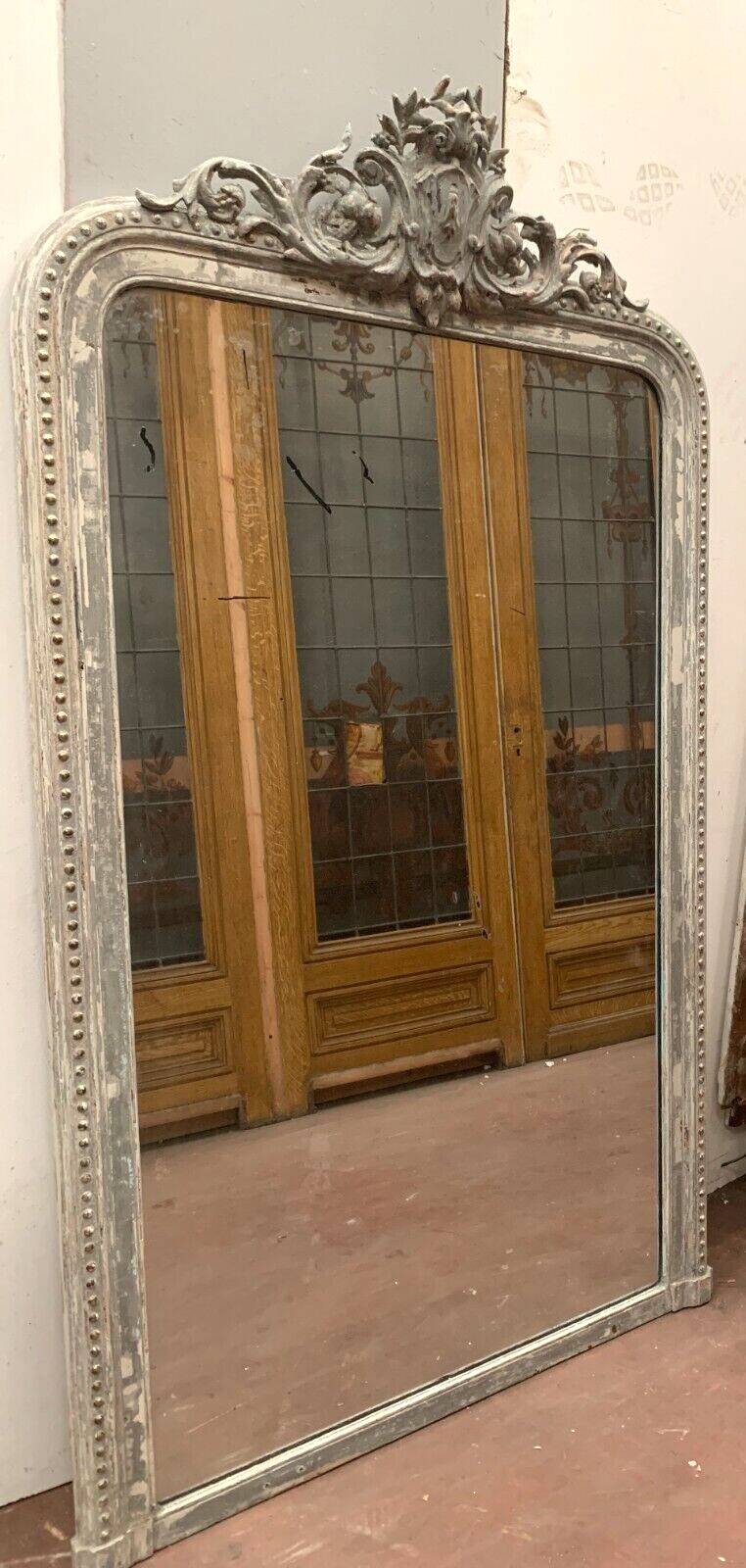 Louis XV style mirror in wood and patinated stucco 19th century