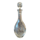 Vintage cut crystal carafe with floral stopper.