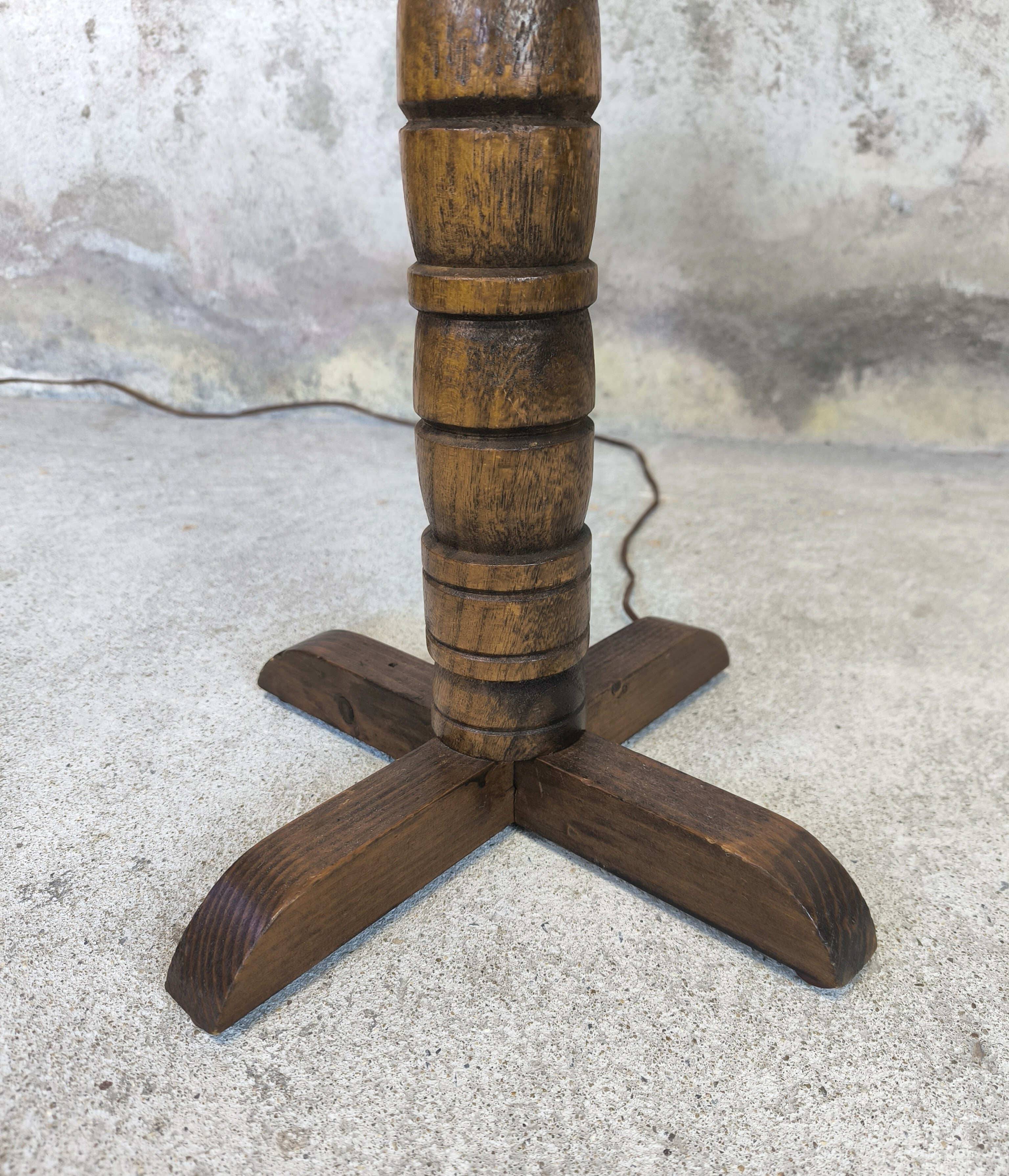 Vintage brutalist floor lamp made of turned wood.