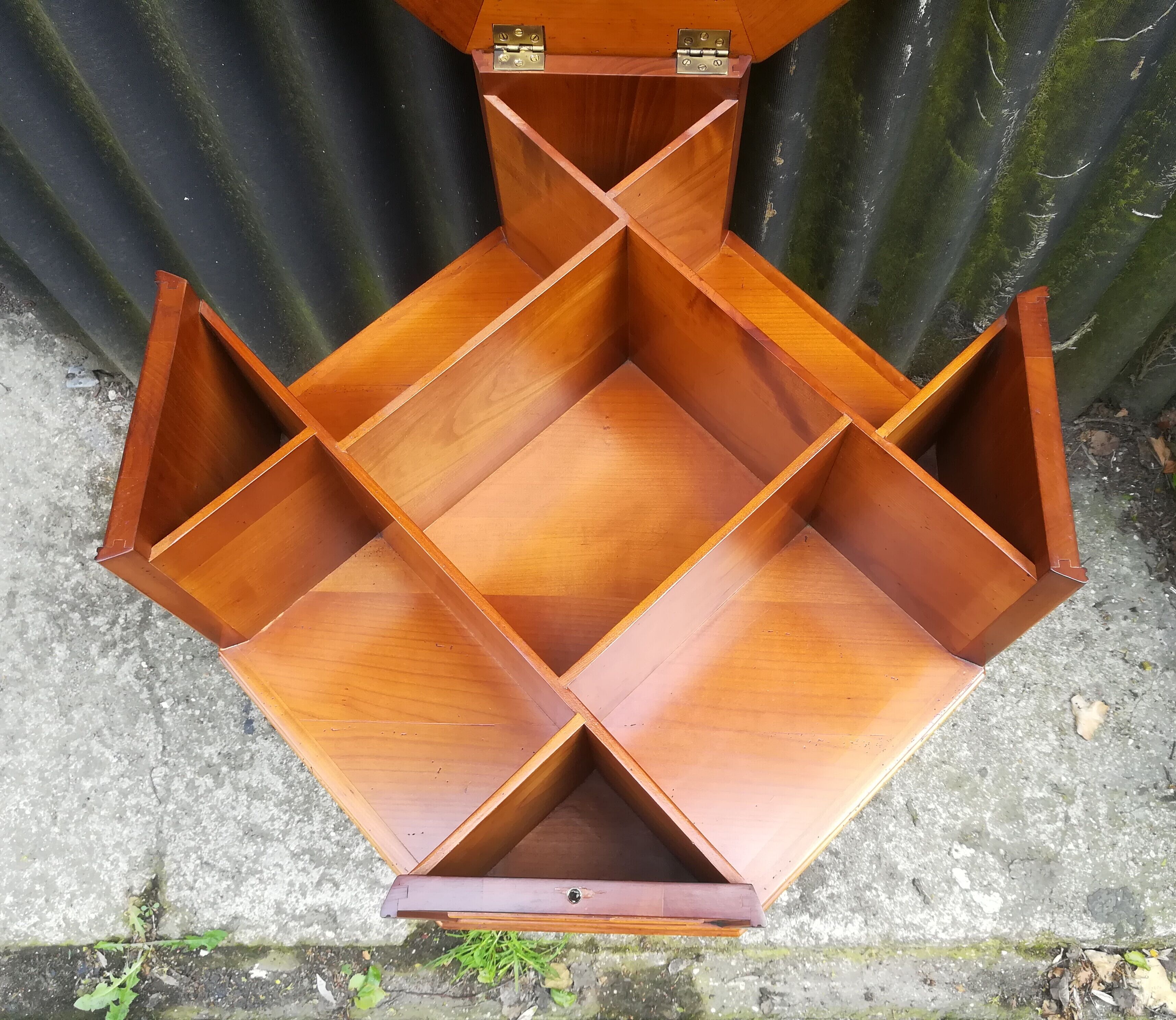 Storage cabinet revolving in cherry