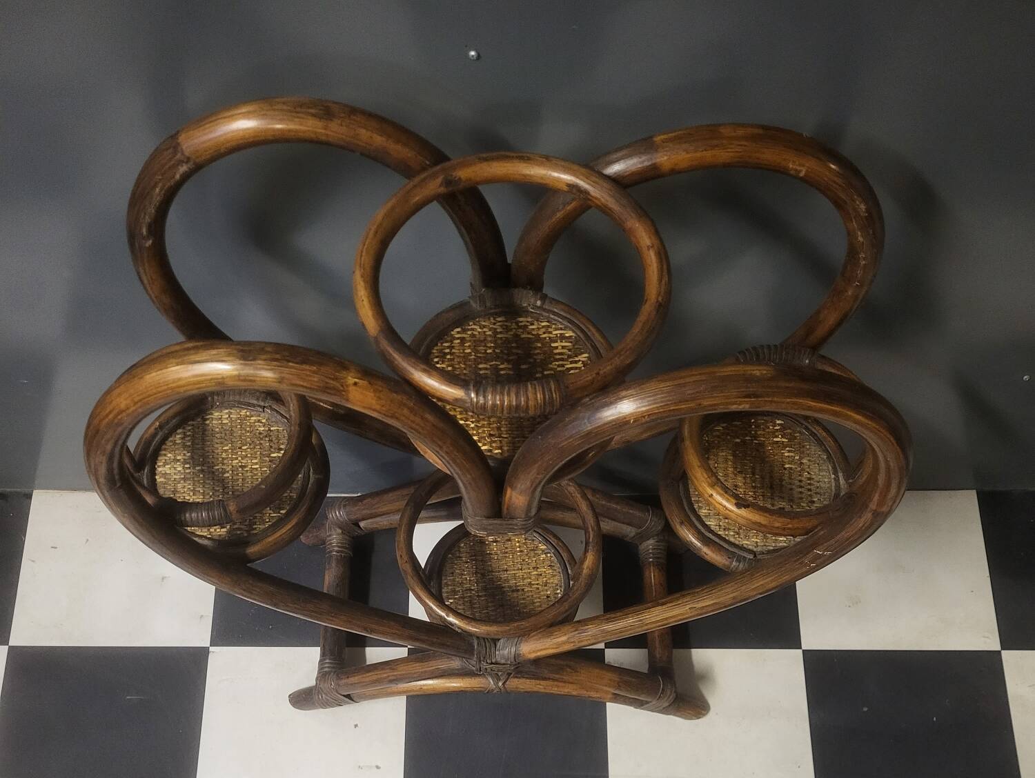 Authentic vintage wicker rattan plant stand planter.