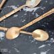 Set of 12 old brass teaspoons