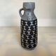 Vase made of matte and glazed ceramic.