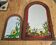 A pair of vintage stained glass style mirrors.