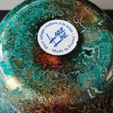 Large signed Line Lacquered Ball Vase. Made of églomisé glass. Dimensions: 18 x 16 cm
