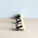 Wall doorpiece three black metal and yellow sheet metal