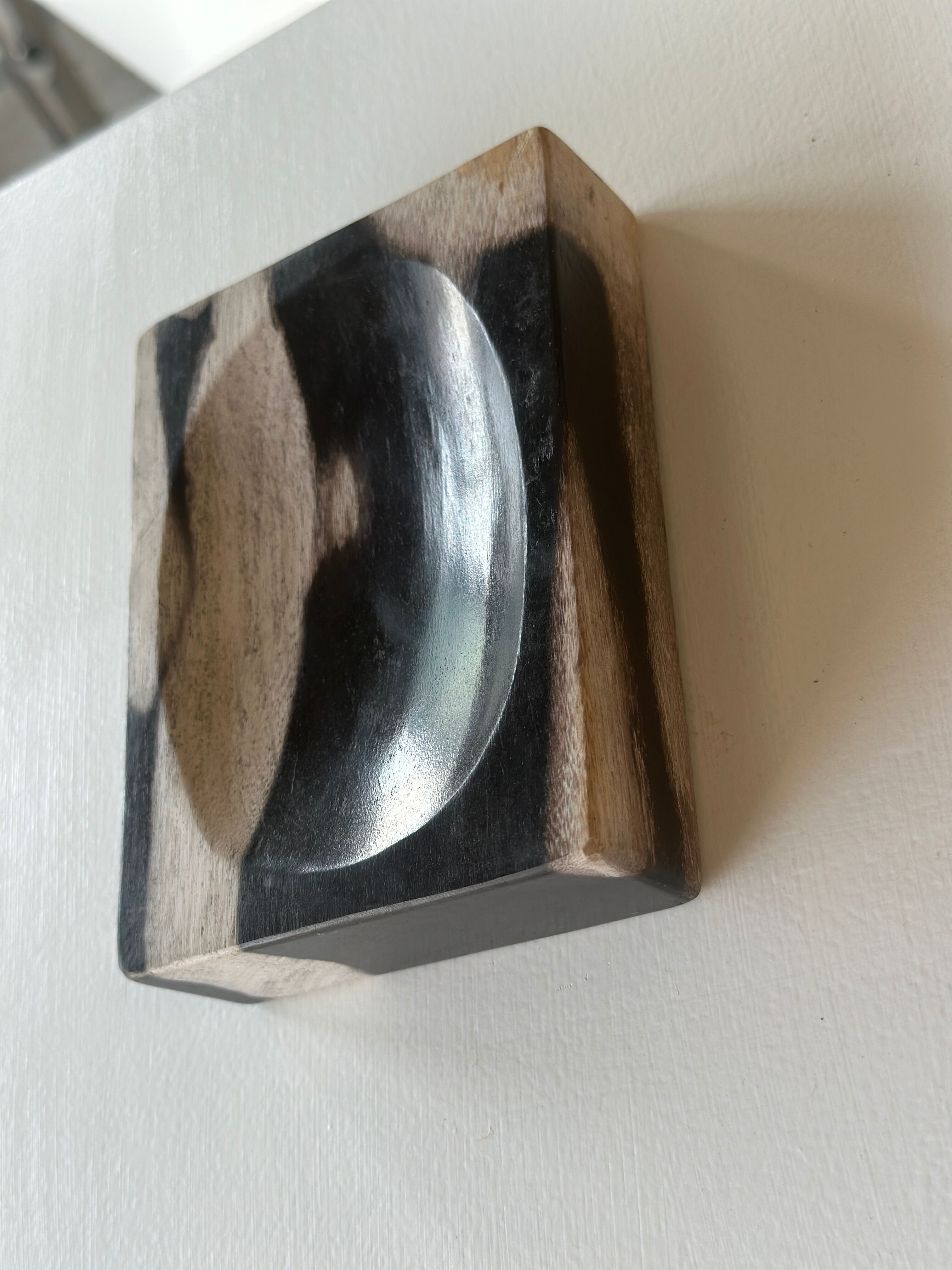 Symmetrical multicolored petrified wood soap dish