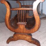 Worker from the 19th century with lyre base