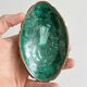 Mini bowls in malachite for jewellery or rings.