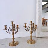 Pair of four-light candle holders in gilded brass
