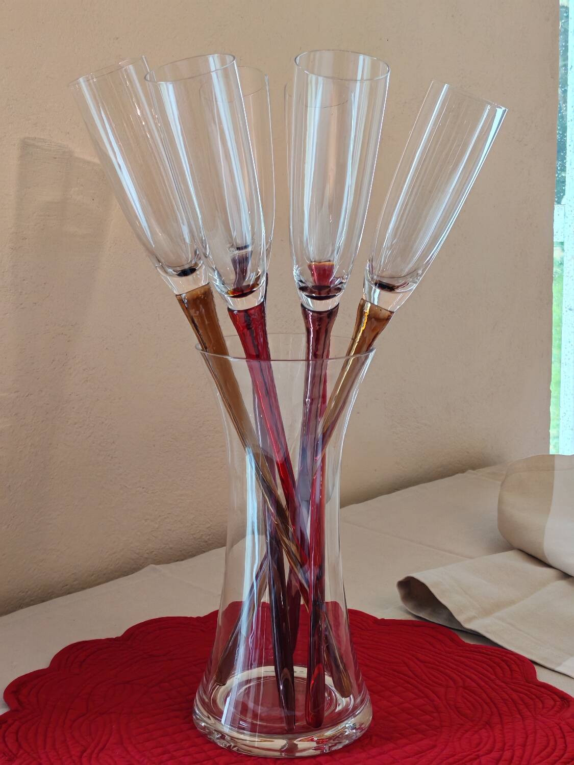 Champagne flutes in their vase