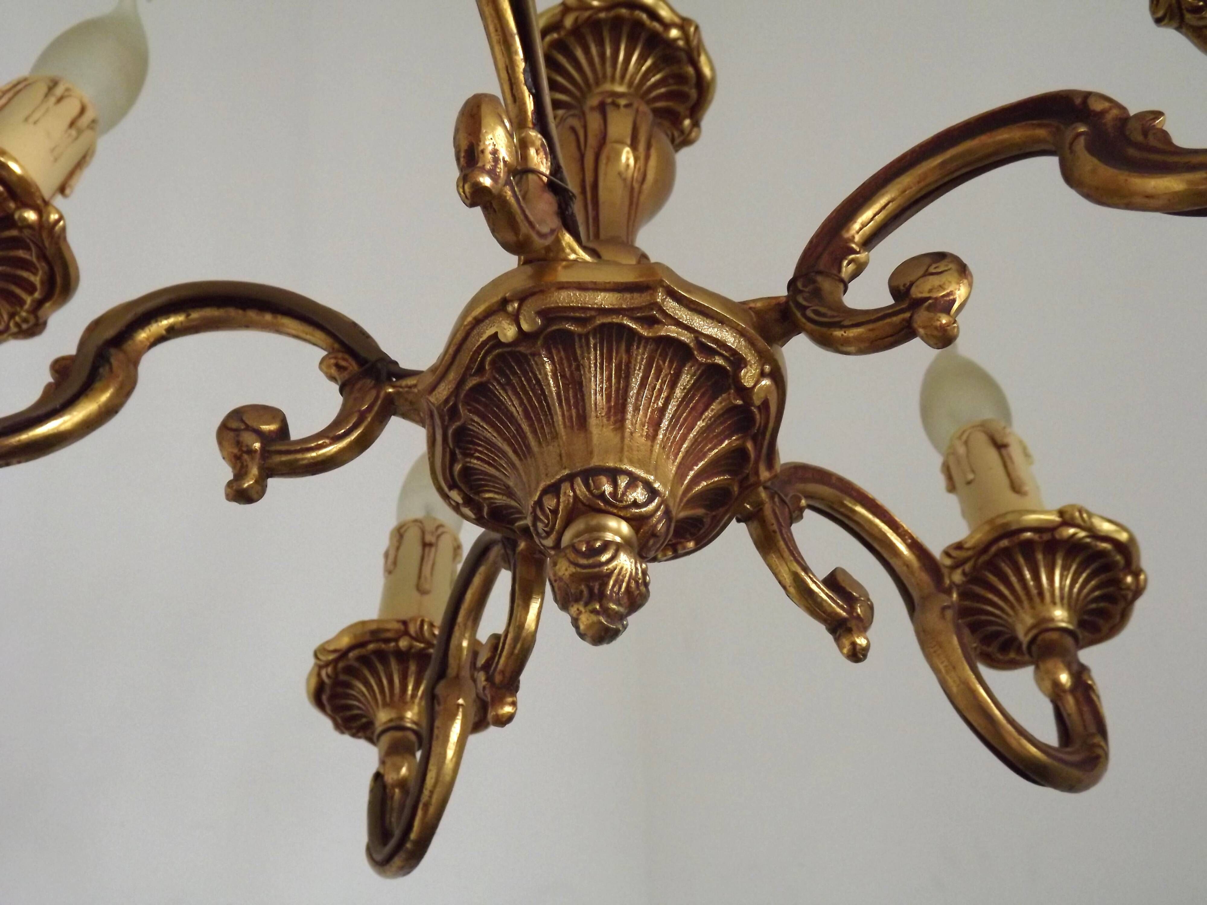 Vintage French traditional style bronze chandelier with 5 lights featuring acanthus leaf details.