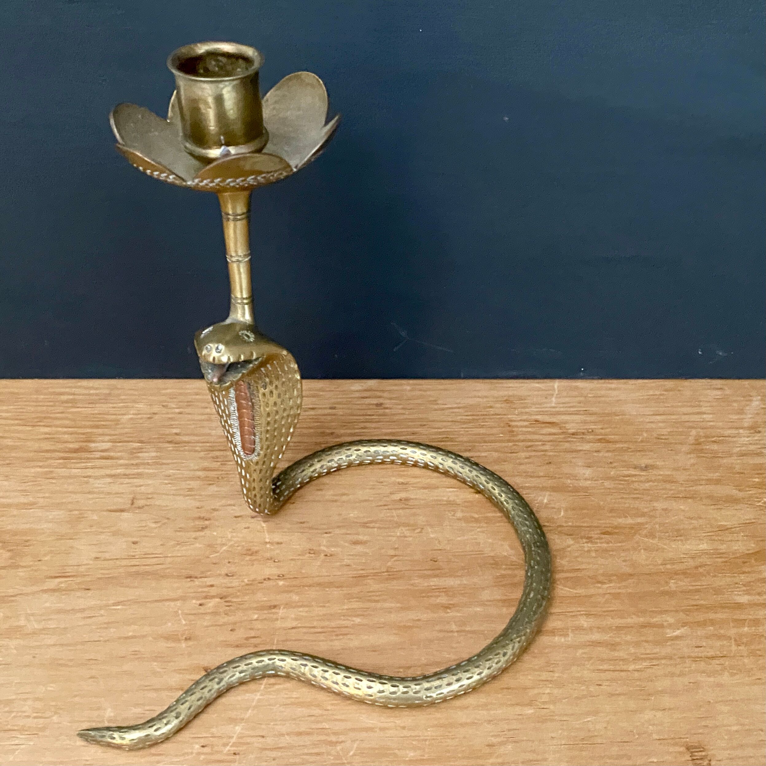 Brass candle holder in the shape of cobra -snake