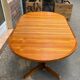Extendable round table in teak from the 60s with two extensions