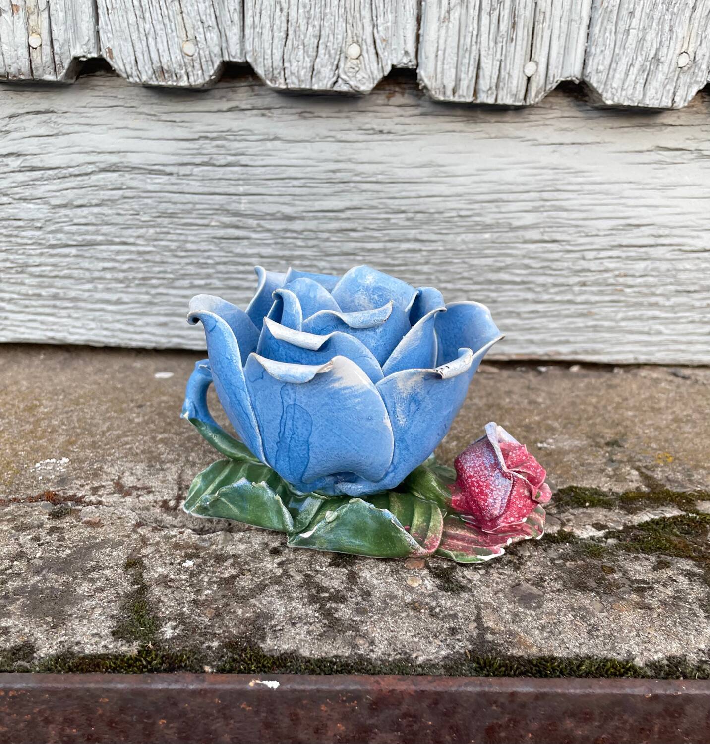Old barbotine candle holder in the shape of a rose