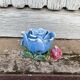 Old barbotine candle holder in the shape of a rose