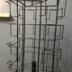 Display postcards and photos in black metal turnstile