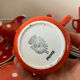 Coffee service, orange earthenware cups from Digoin Sarreguemines.