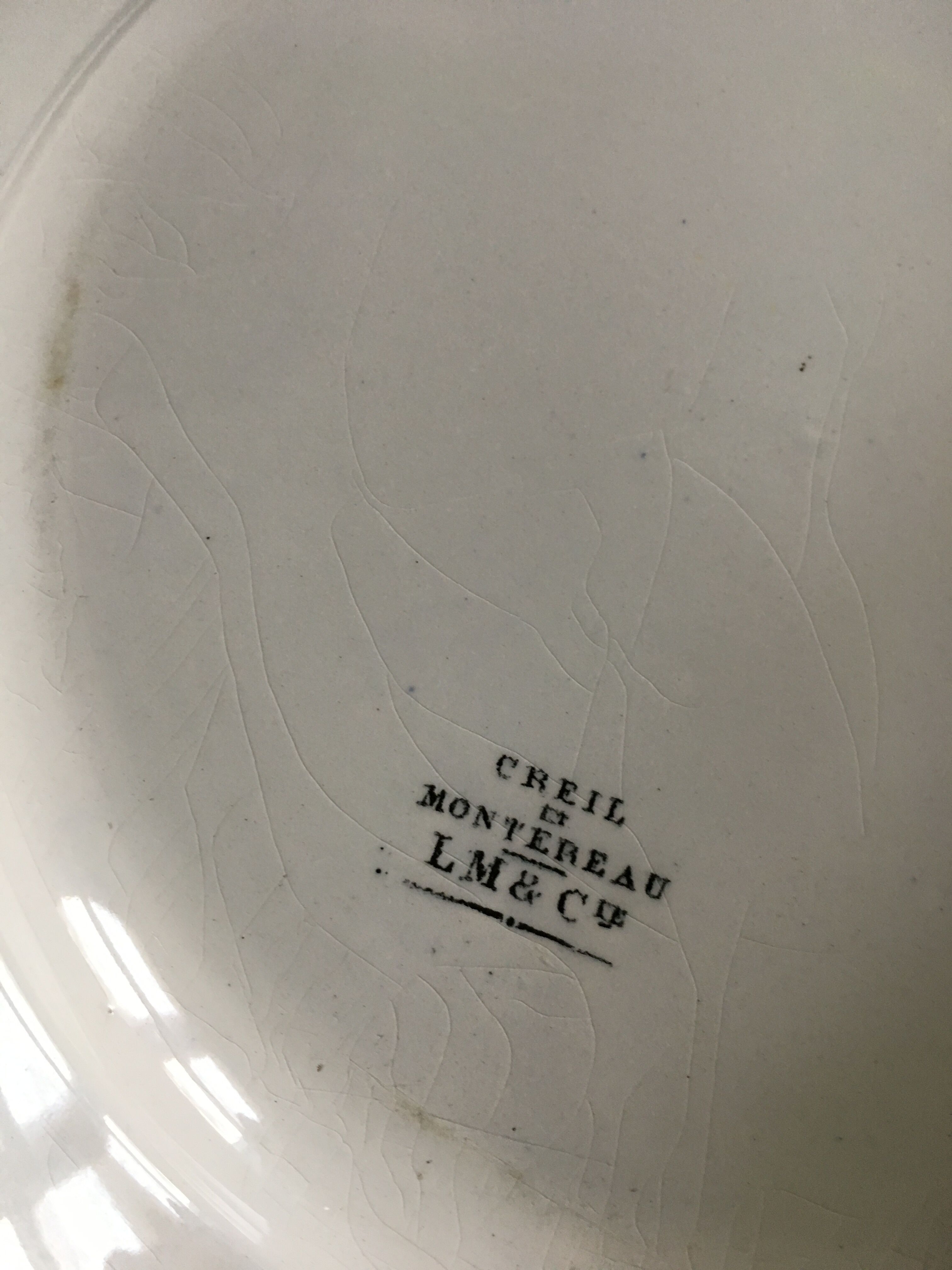 Eight plates with arms Creil and Montereau early 20th