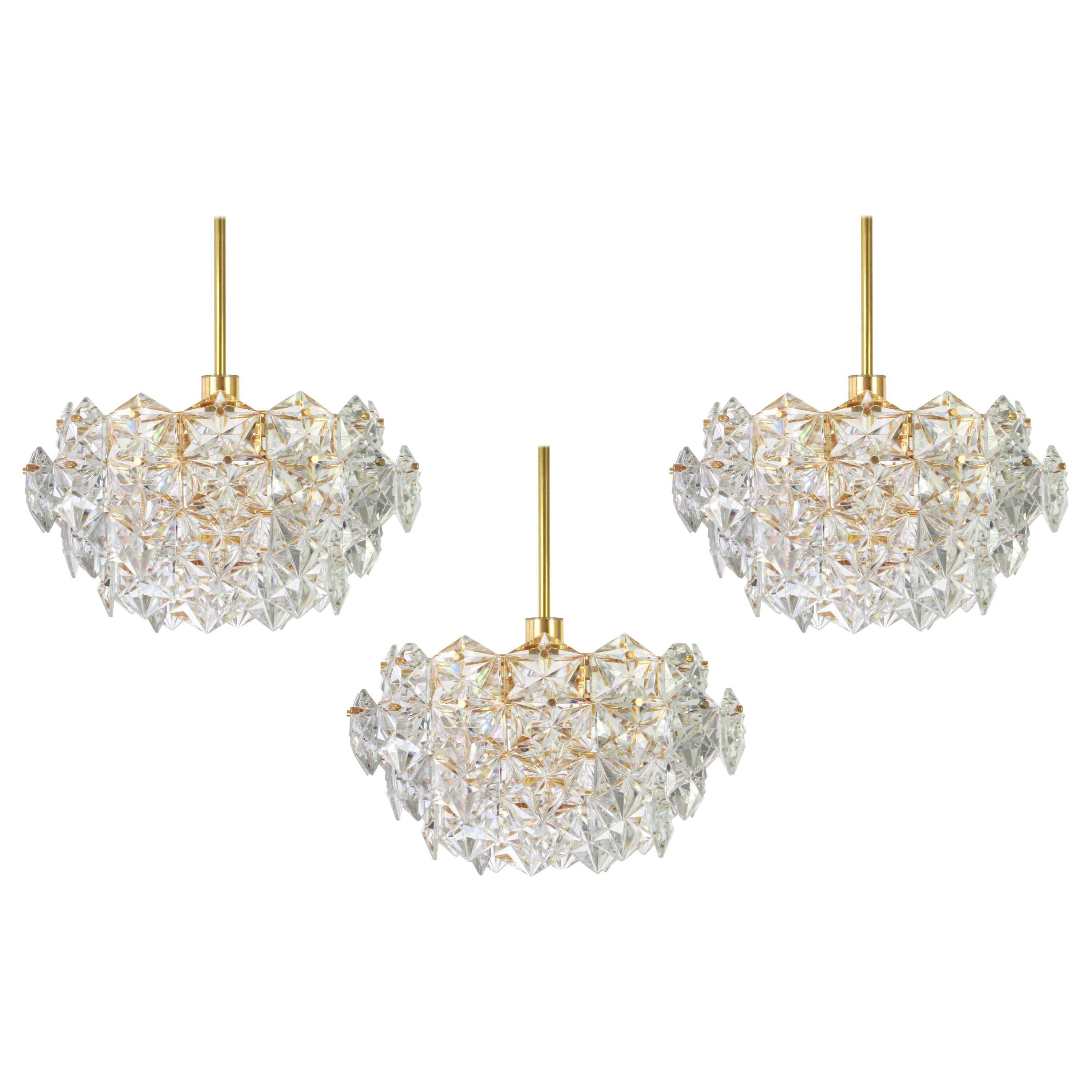 Brass and crystal glass chandelier by Kinkeldey, Germany, 1970s.