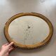Old oval mirror stitched