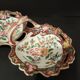 Double porcelain servant with floral decoration, polychrome and gilding – f