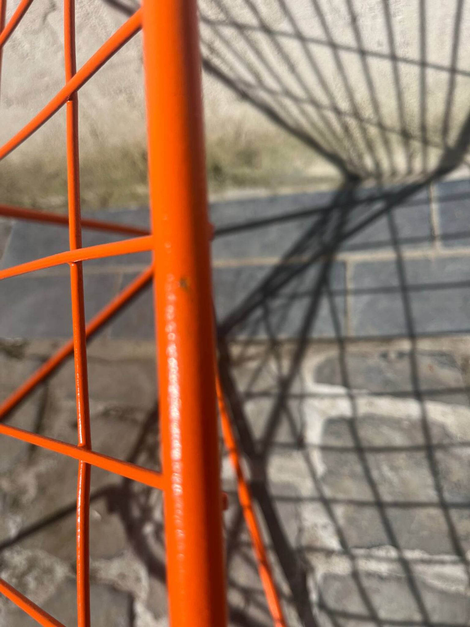 Orange lattice armchair