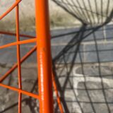 Orange lattice armchair