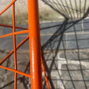 Orange lattice armchair