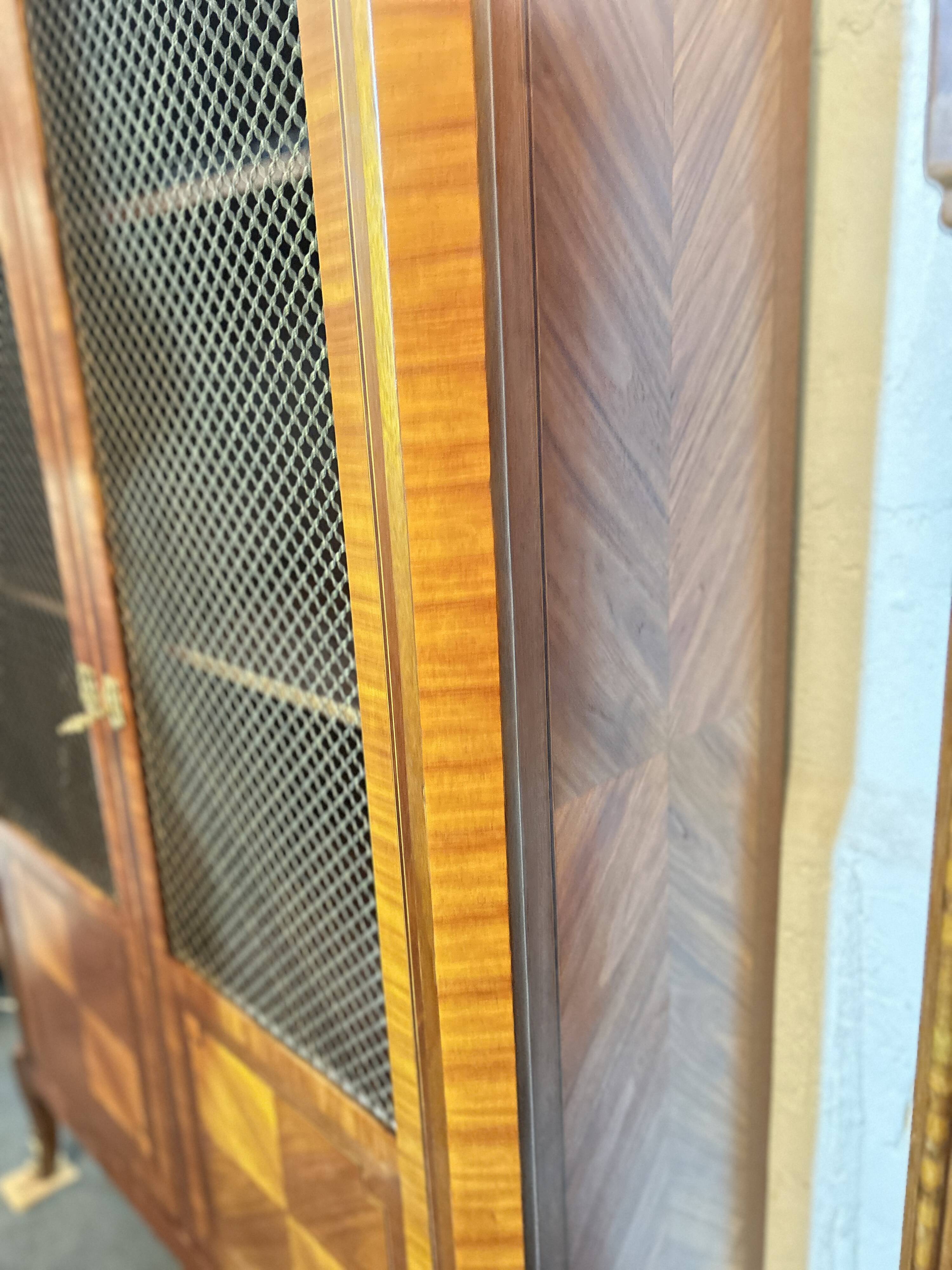 Directoire style display cabinet with two doors