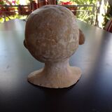 Child bust in terracotta