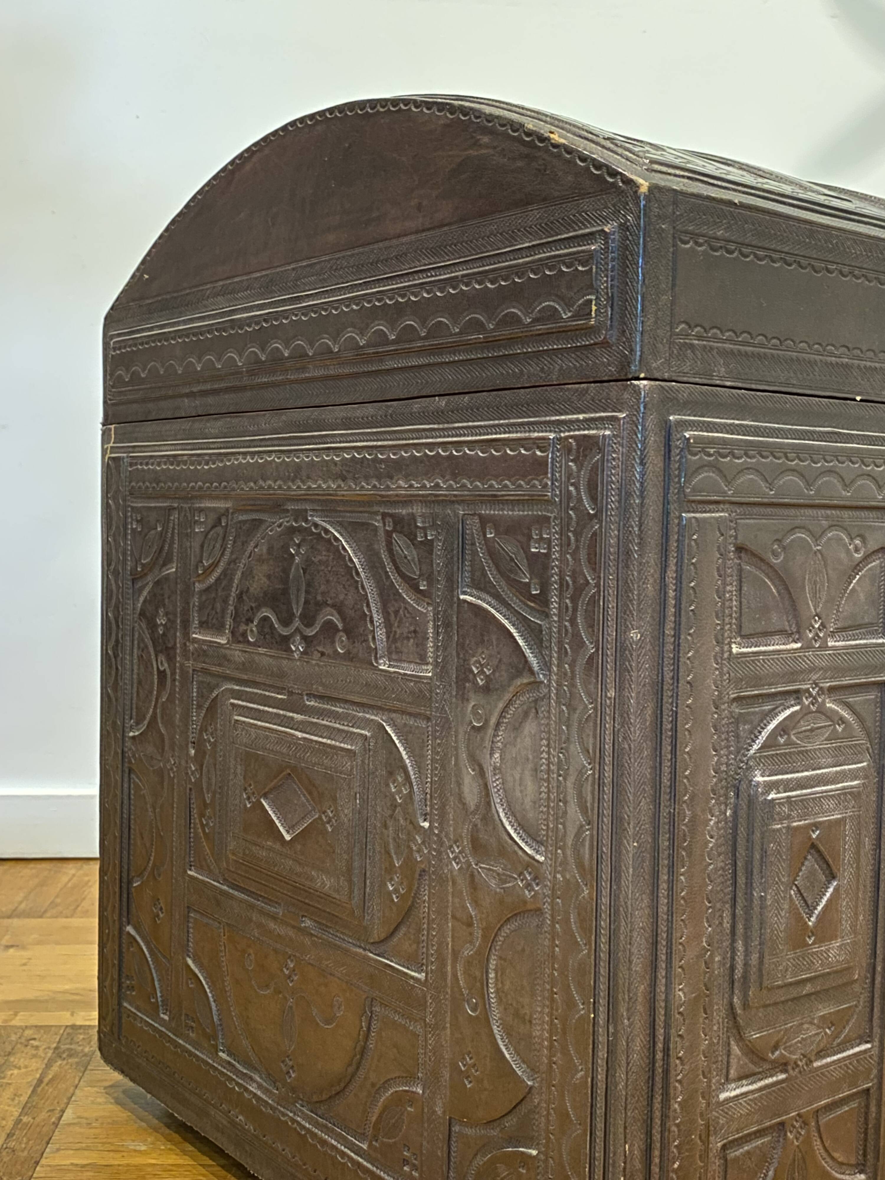 Brown leather and wood domed chest