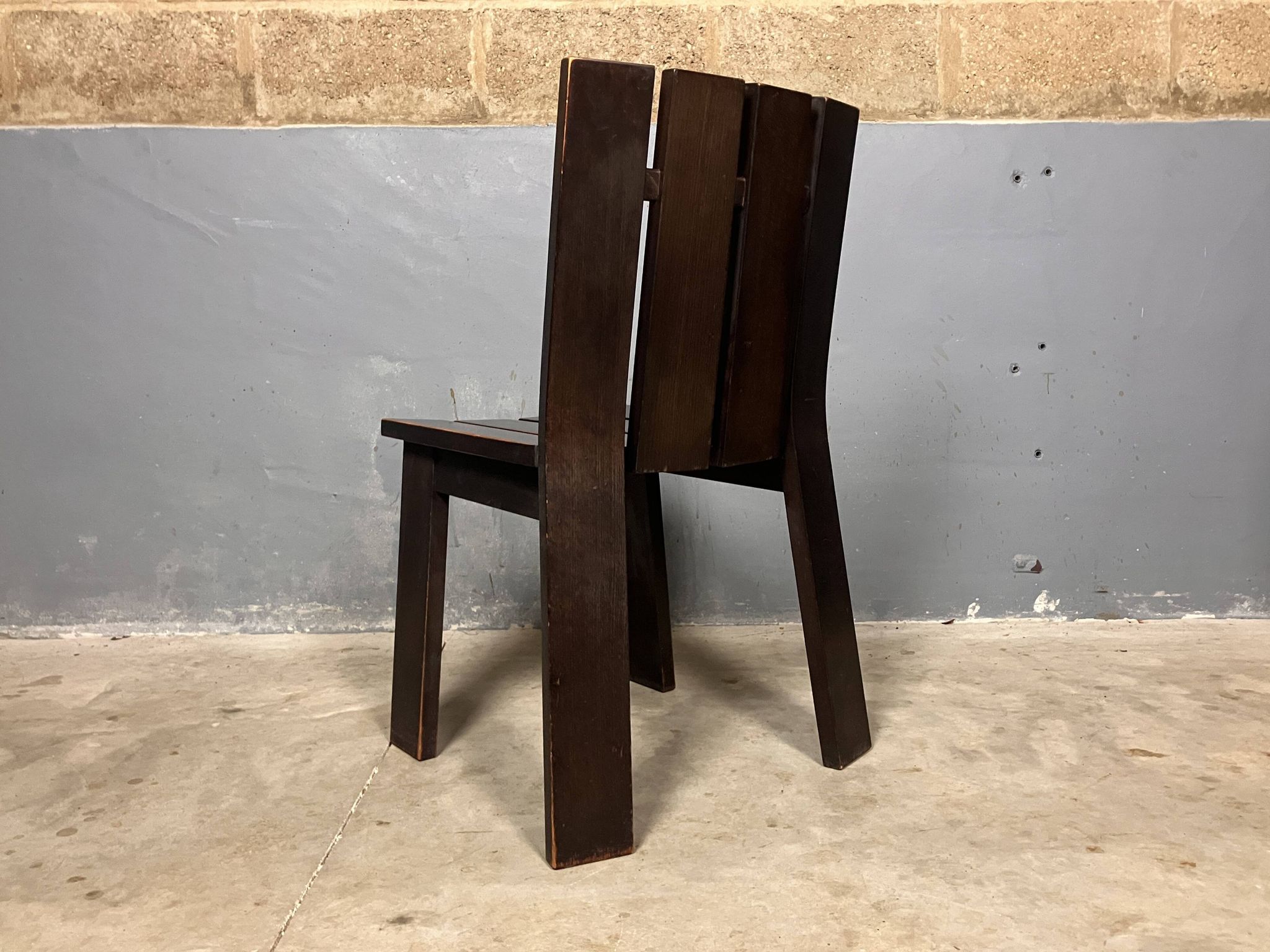 Brutalist and modernist dining chairs from the 1970s in architectural brown wood.