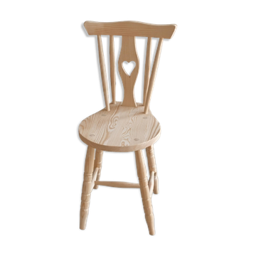 Rustic style chair in raw solid pine with heart.