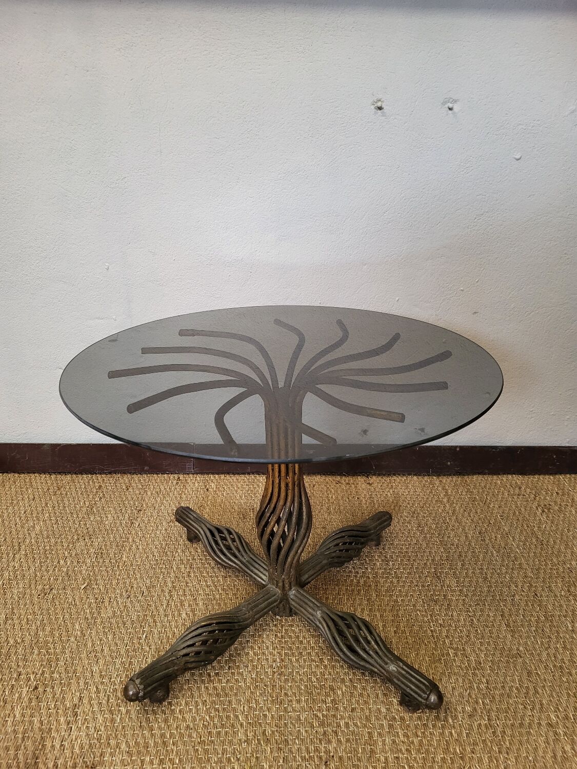 1970s modernist coffee table in smoked glass and metal.