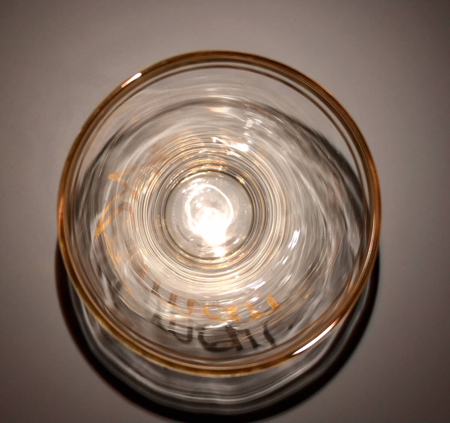 Antique gilded glass with the inscription Maman