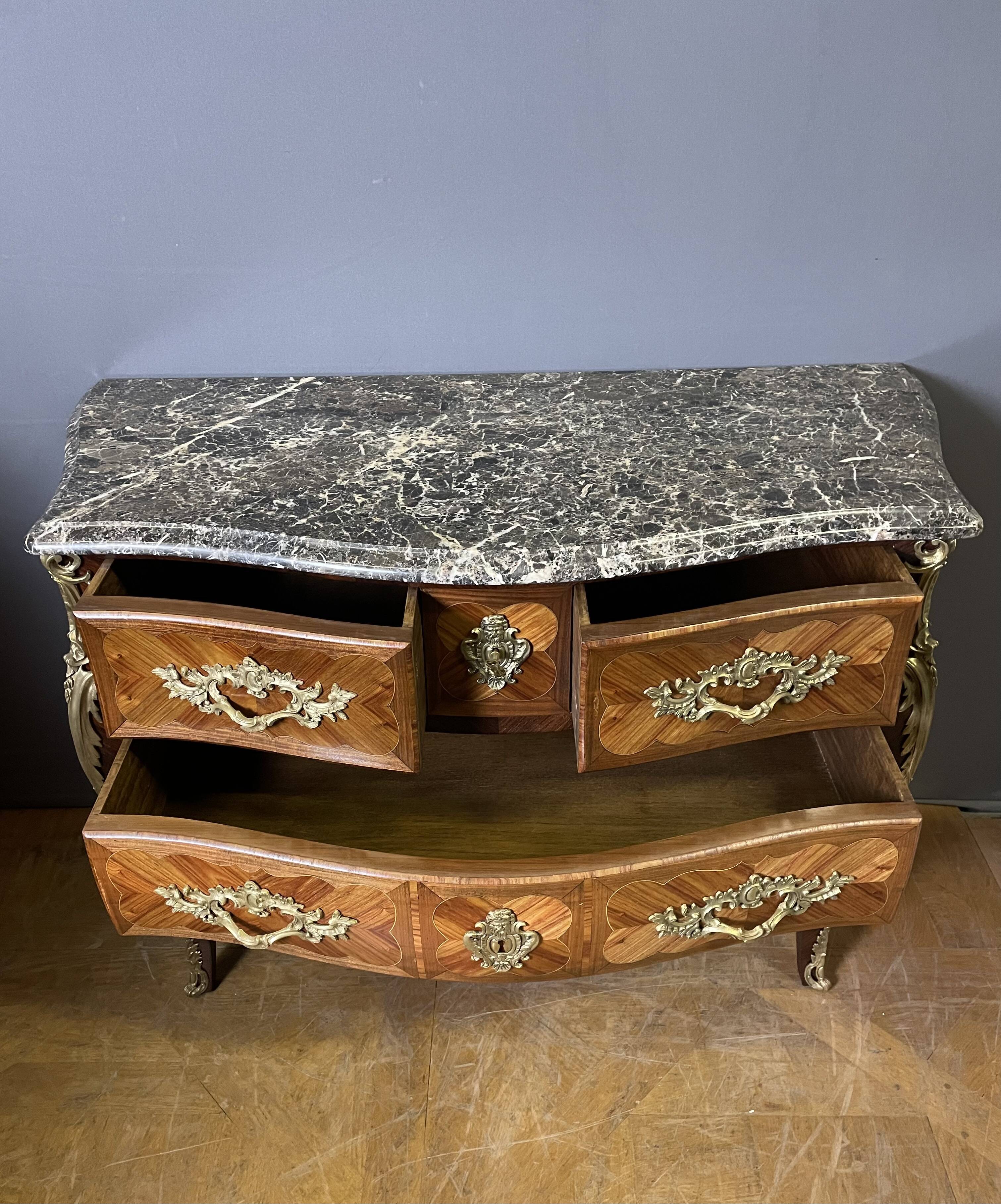 Louis XV style commode in marquetry from around 1920.