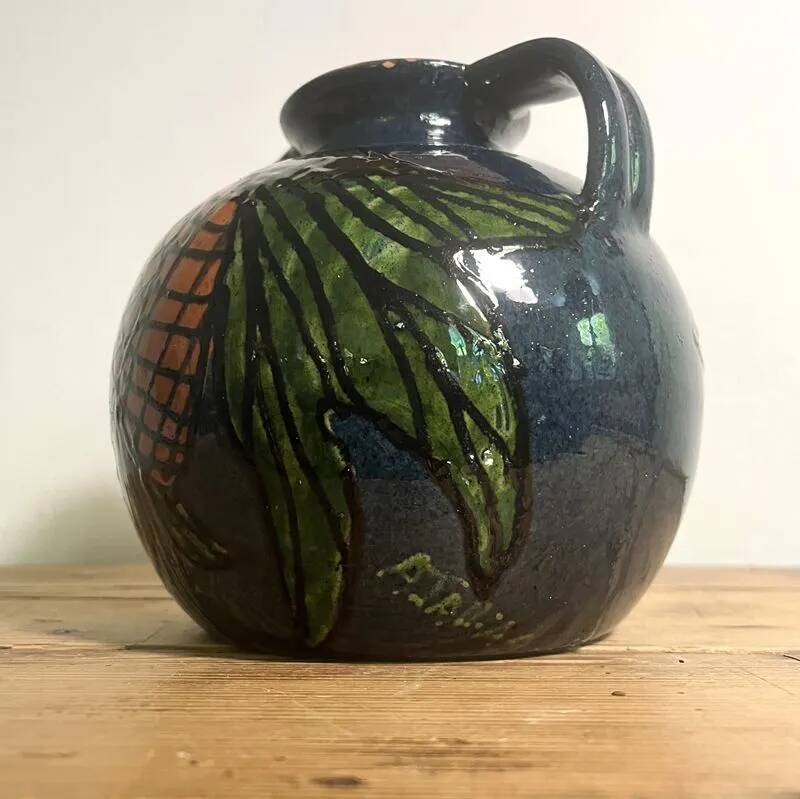 Glazed terracotta round vase