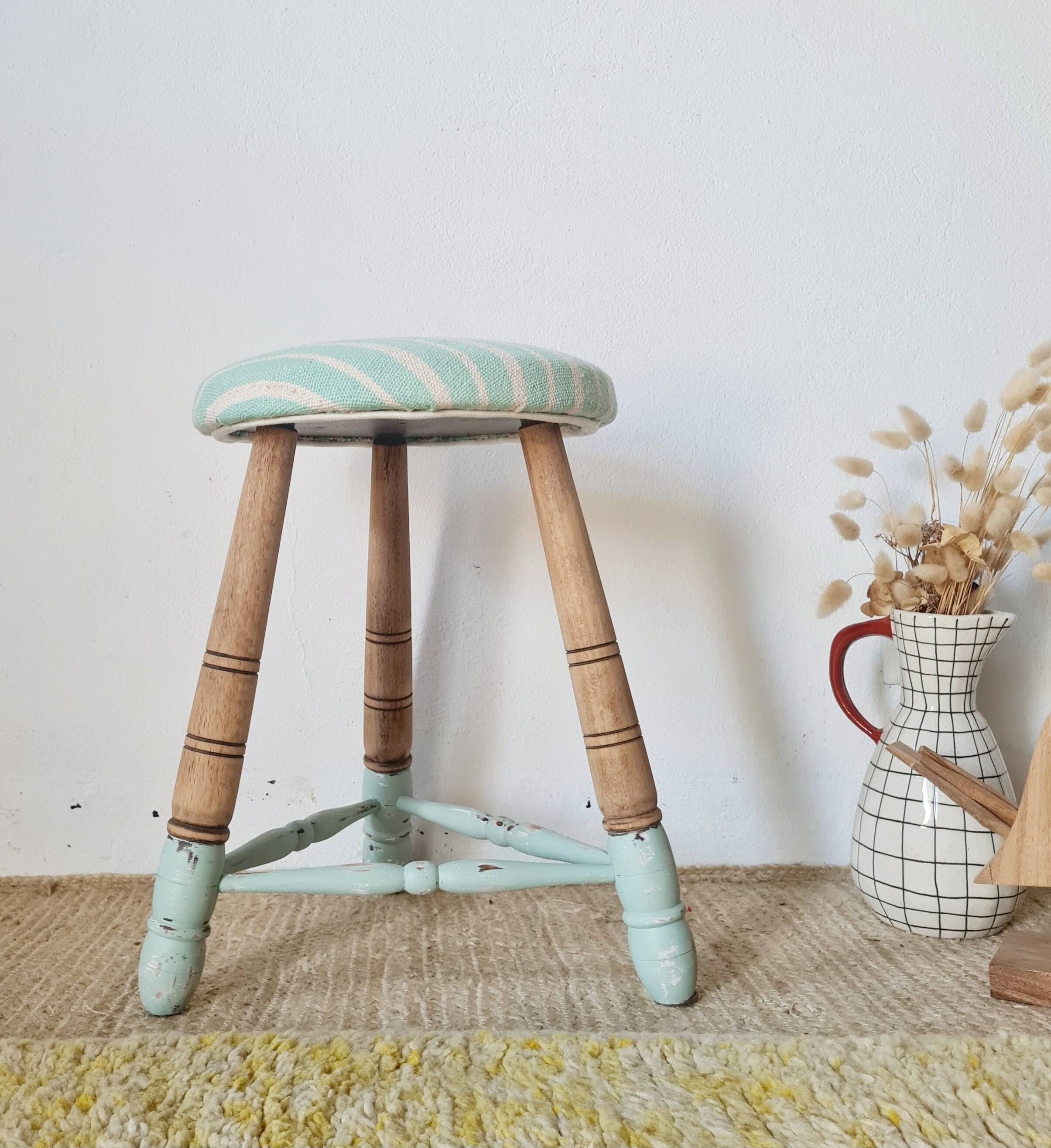 Antique tripod stool with striped seat