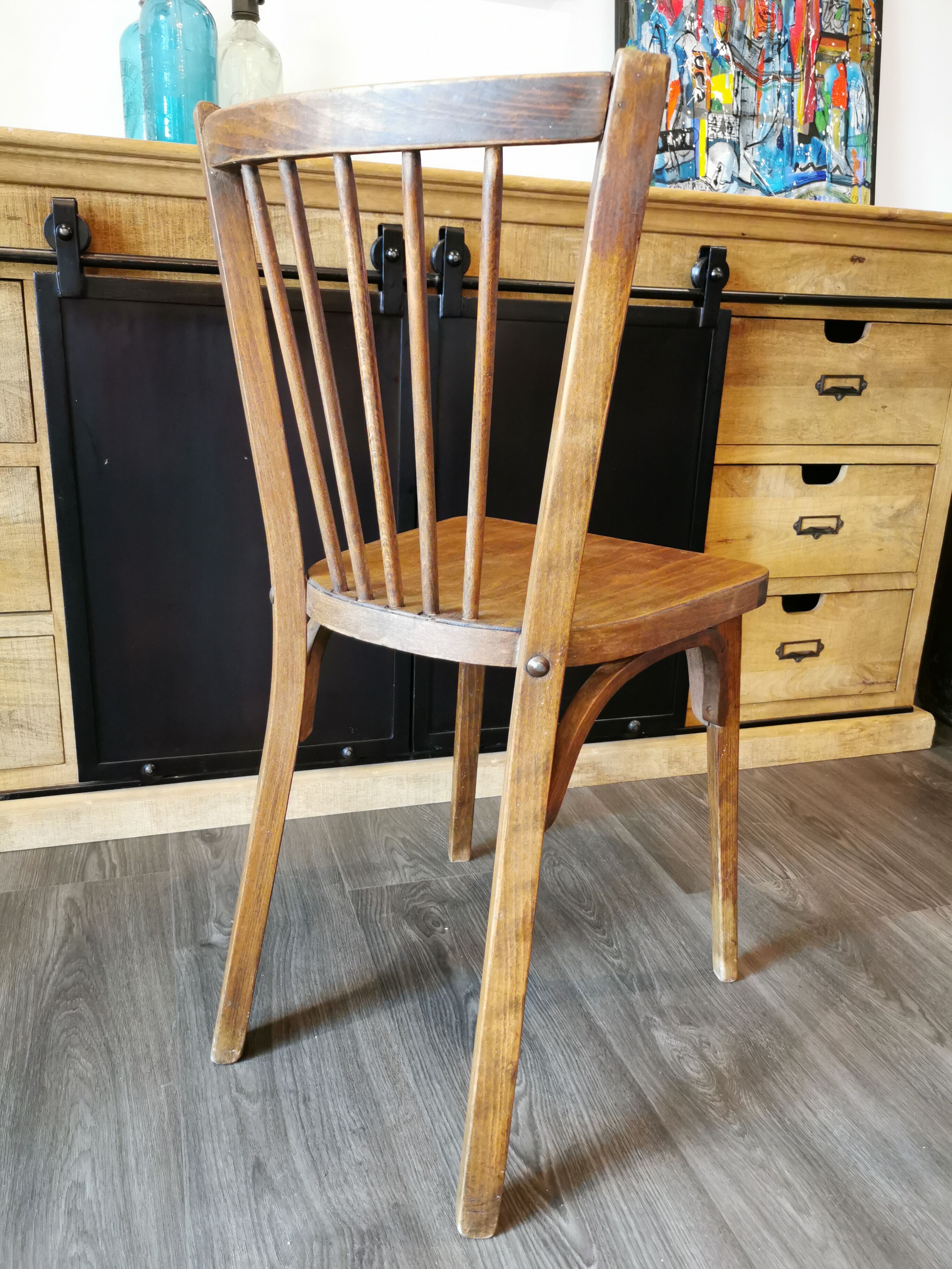 Series of 6 mismatched bistro chairs Baumann and Mahieu