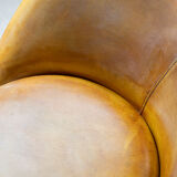 Leather swivel armchairs, early twenty-first century, set of 2