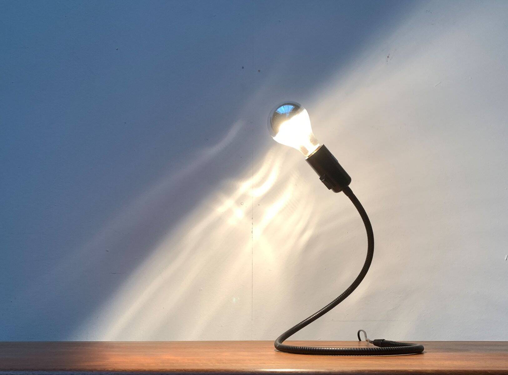 Lightworm minimalist table lamp by Walter Schnepel for Tecnolumen.