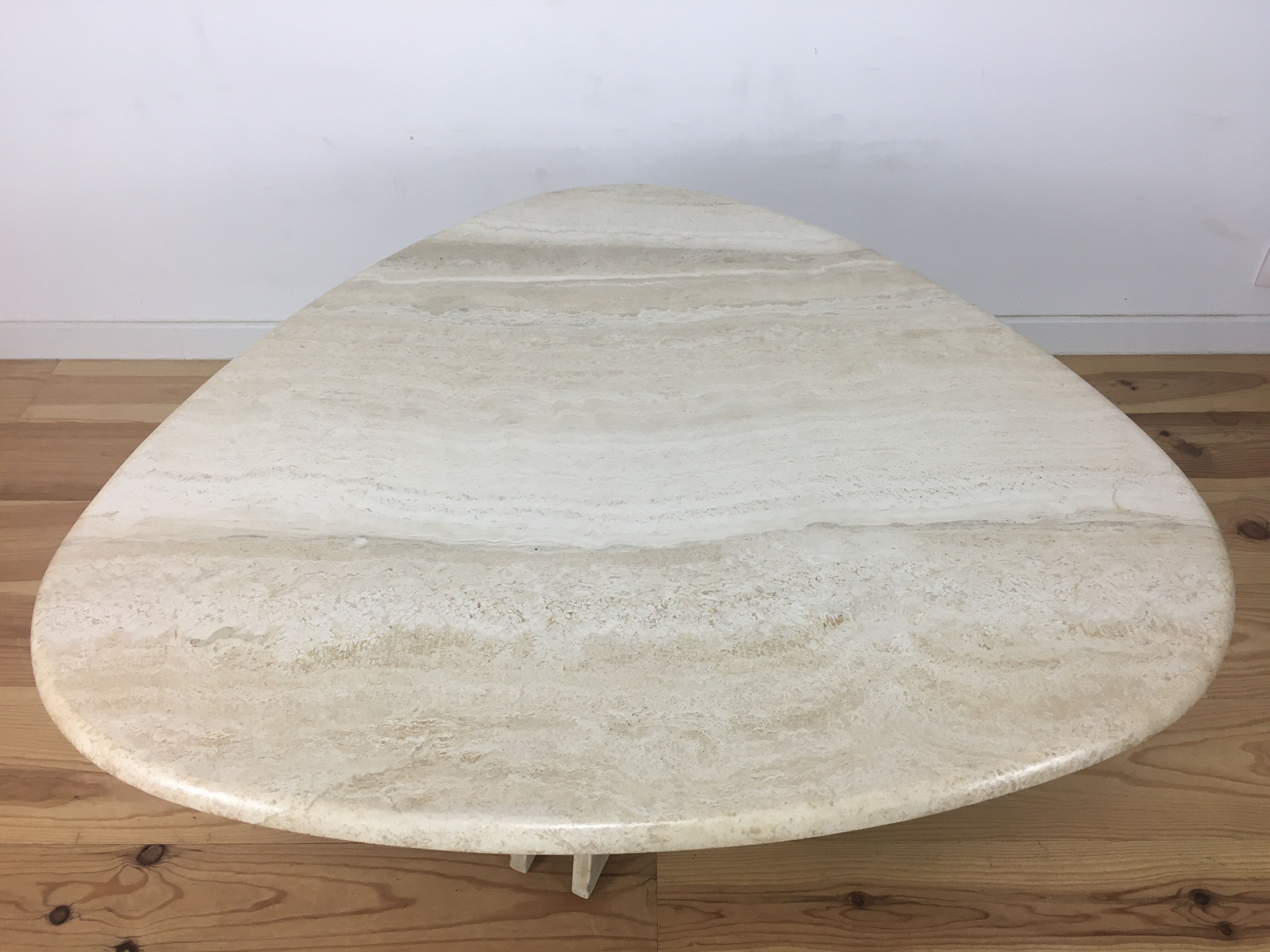 Travertine coffee table goes up and down to jack