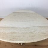 Travertine coffee table goes up and down to jack