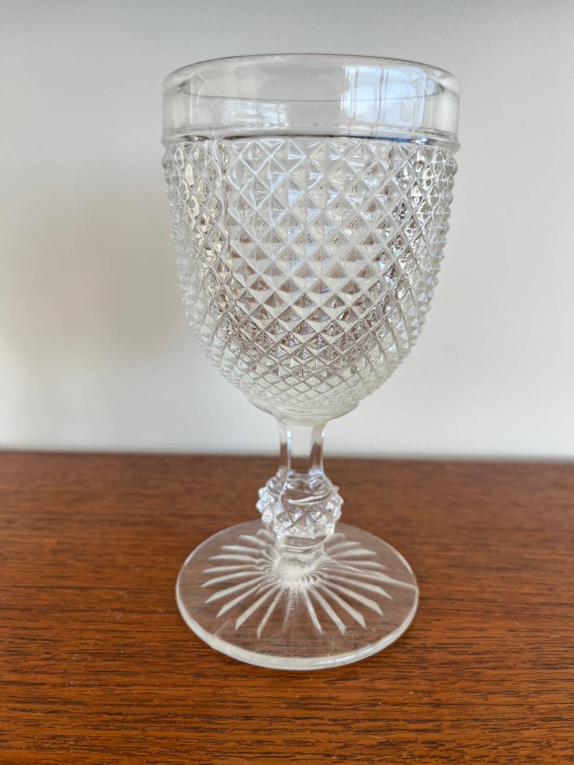 Two 19th-century moulded crystal glasses with diamond points.