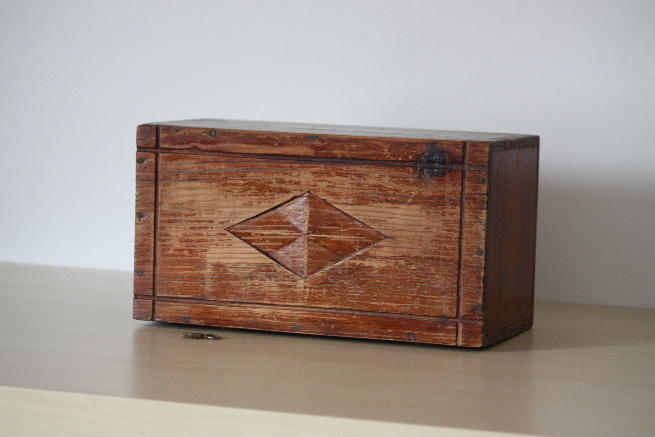 Carved wooden box with lock