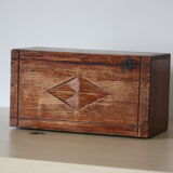 Carved wooden box with lock