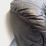 Vintage corner sofa composed of 3 modules in black leather with integrated bed.