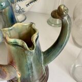 Turquoise glazed ceramic pitcher