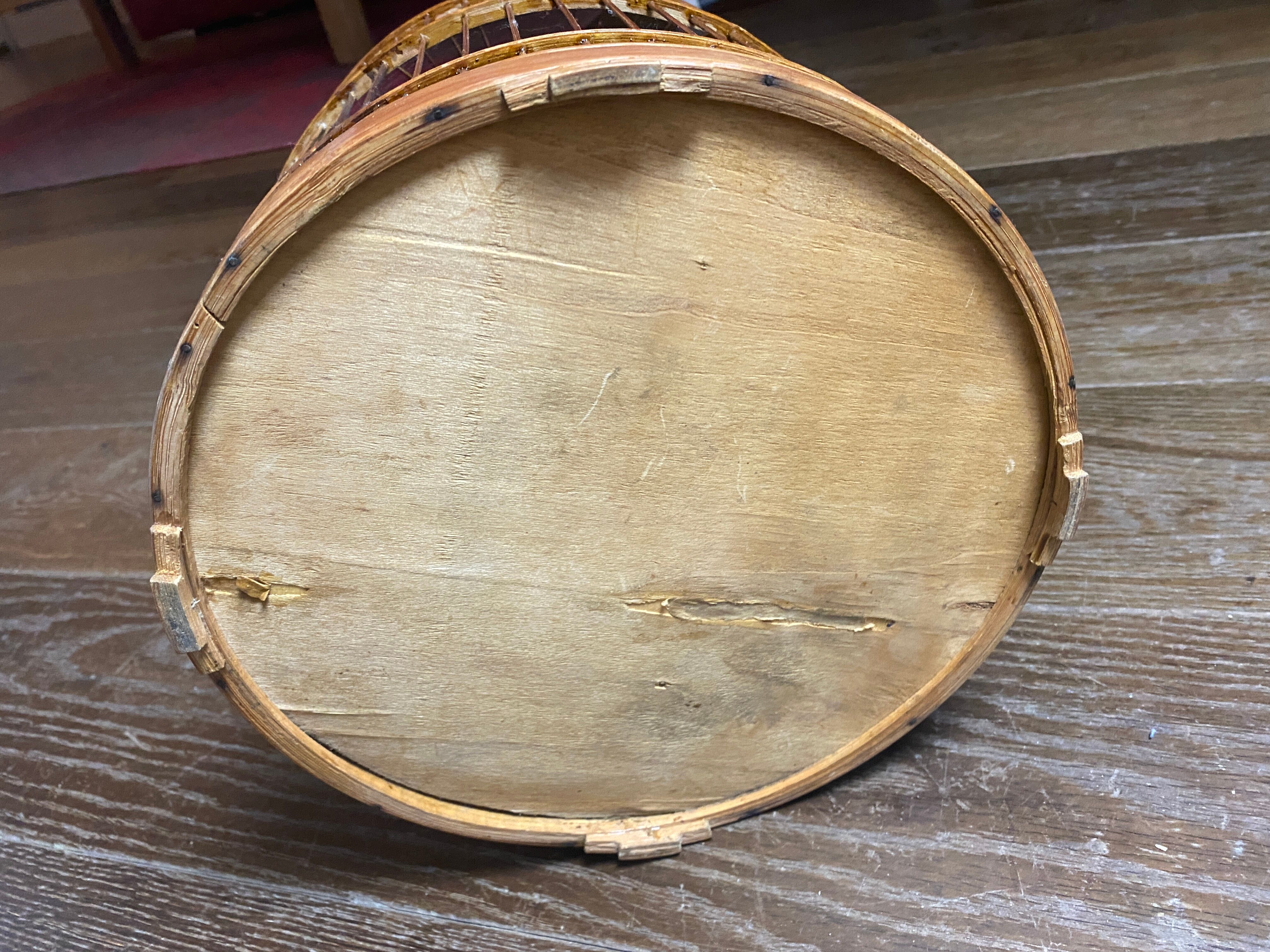 Old bird cage made of bamboo and wood